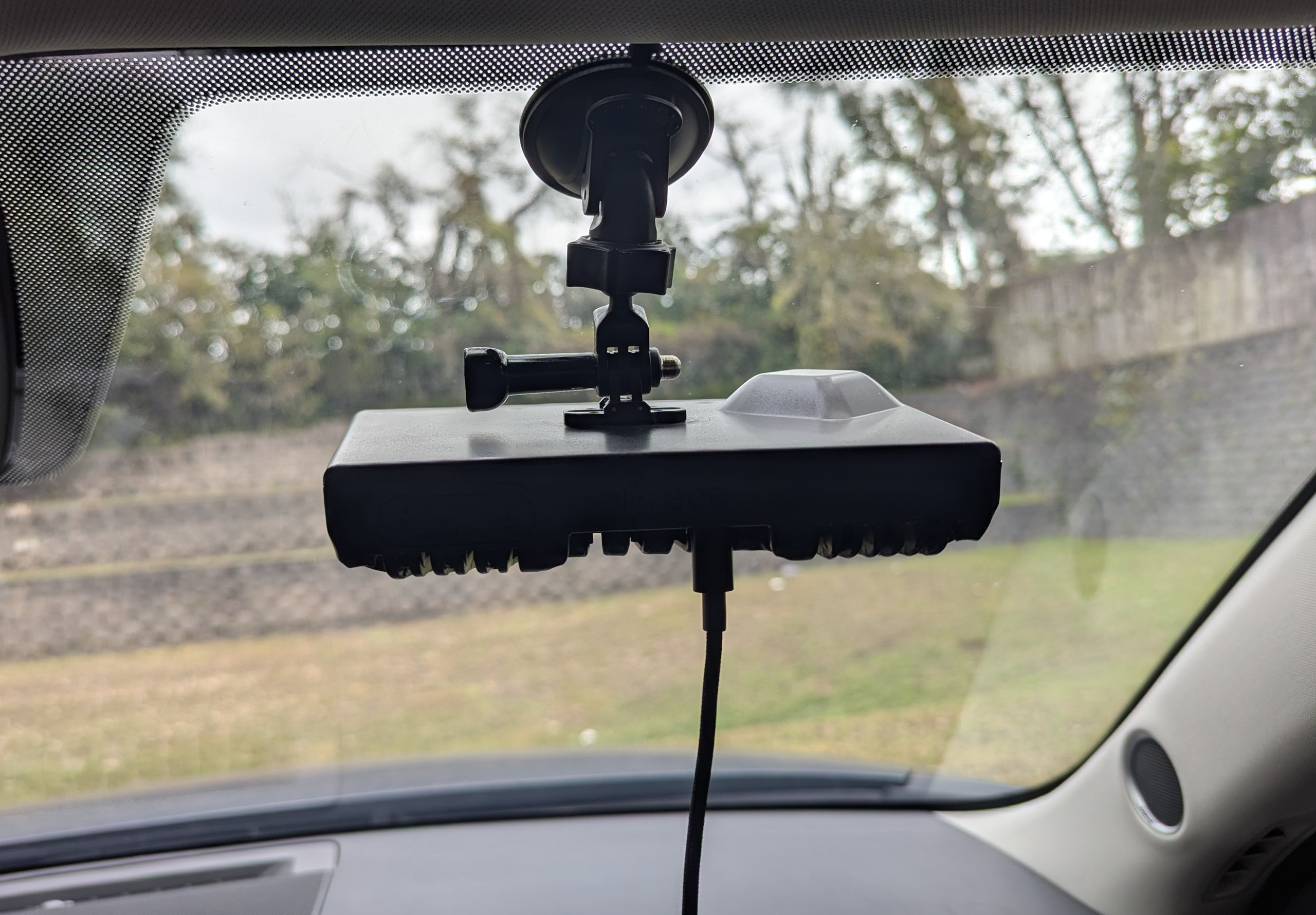 Dashcam placed in the windshield of a vehicle